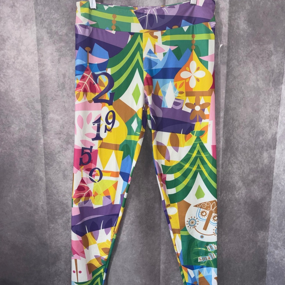 NWT Disney Parks Walt Disney Women Large MultiColor It's a Small World Leggings